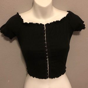 black crop top, clasps in the front